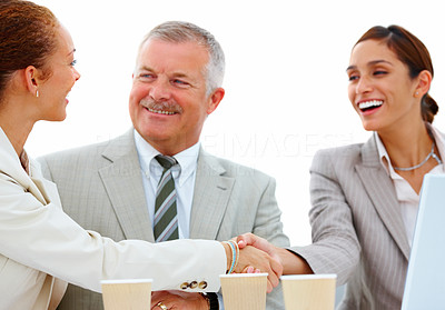 Business team - Business people making a deal