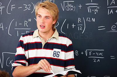 Education - Male teacher teaching mathematics