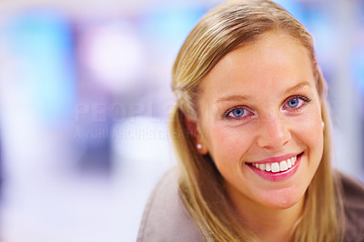 Portrait of a beautiful blond with blur background