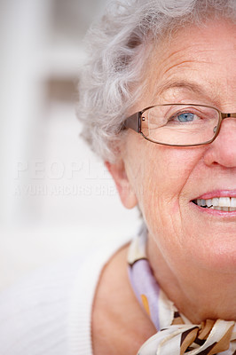 Extreme closeup of an old woman smiling