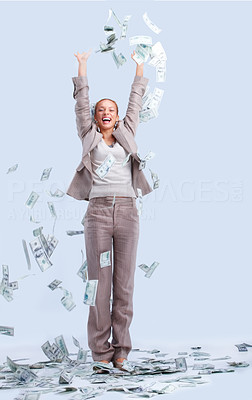 Successful woman in business with money raining