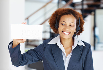 Happy woman holding blank white card