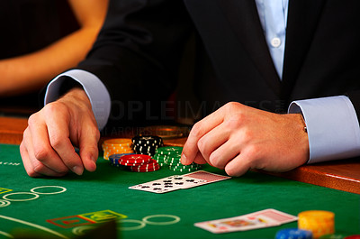 Dealer handling cards at a casino