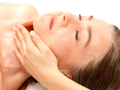Happy woman getting face massage