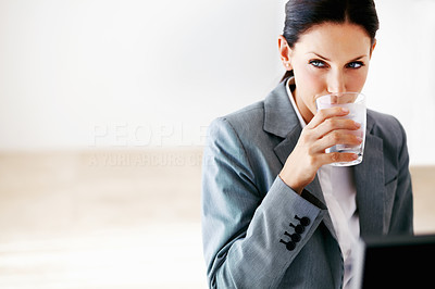 Business woman drinking water