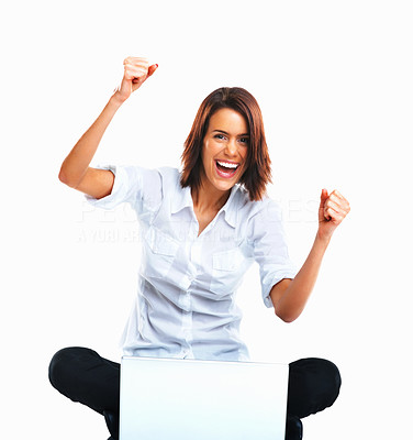 Excited young woman with laptop cheering with hands raised