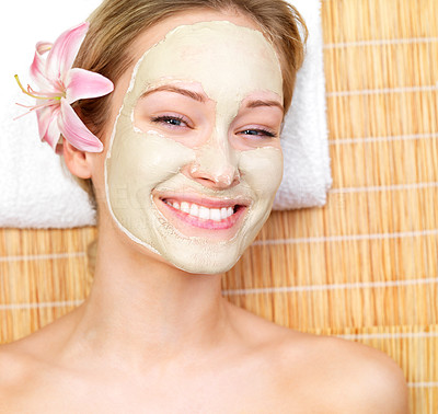 Smiling beautiful woman with face mask