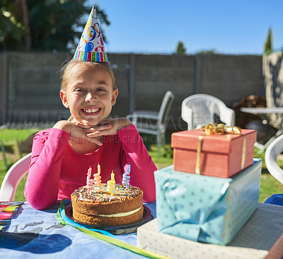 Buy stock photo Portrait of a happy little girl enjoying her birthday party outdoors