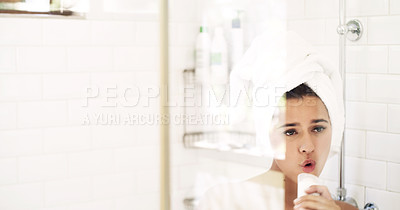 Buy stock photo Shot of an attractive young woman singing while going through her morning beauty routine at home