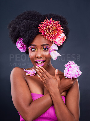 Pics of Studio shot of a beautiful young woman posing with flowers in her hair, stock photo, images and stock photography PeopleImages.com. Picture 2094142