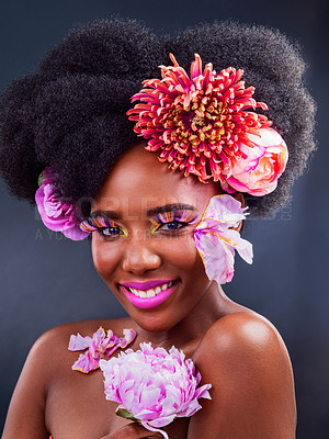Pics of Studio shot of a beautiful young woman posing with flowers in her hair, stock photo, images and stock photography PeopleImages.com. Picture 2094166