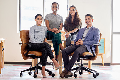 Buy stock photo Shot of a group of colleagues in an office at work