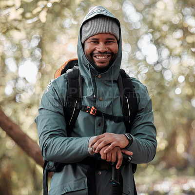 Buy stock photo Shot of a man wearing a windbreaker while out on a hike