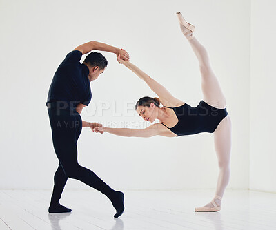 Buy stock photo Studio shot of a young couple rehearsing their routine