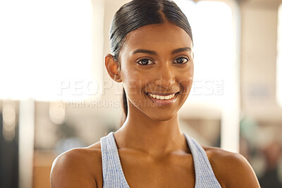 Buy stock photo Portrait of a fit young woman working out in a gym