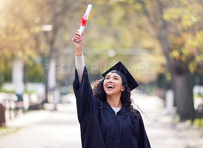 Buy stock photo Shot of a young woman cheering on graduation day