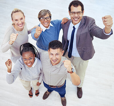 Buy stock photo Shot of a group of colleagues celebrating in a office