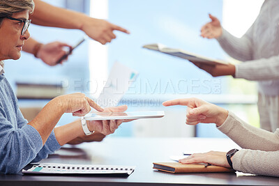 Buy stock photo Shot of a businesswoman using a tablet in a office