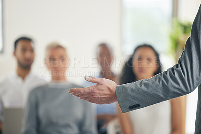 Buy stock photo Shot of a group of business people watching a presentation