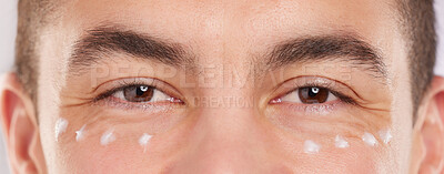 Buy stock photo Closeup shot of a man with cream under his eyes