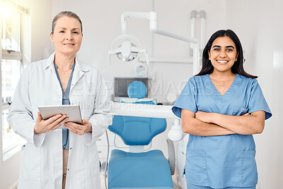 Buy stock photo Shot of two female dentists in their office