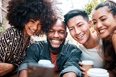 Buy stock photo Diverse group of friends browsing and taking selfies on a cellphone while drinking coffee at a cafe together. Cheerful young students socialising at a restaurant. Two couples enjoying a double date 