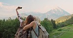 Women on holiday taking selfies. Friends taking selfies together