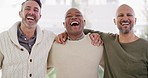 Closeup of three diverse men standing together in unity while smiling, laughing and showing strength in their bond. Biracial group of friends expressing excitement, happiness against bright copyspace